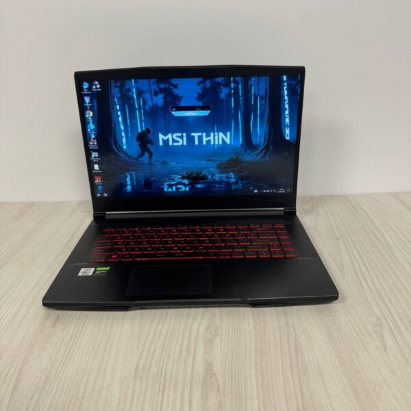 Ігровий ноутбук Б-клас MSI GF65 Thin 10SDR / 15.6" (1920x1080) IPS / Intel Core i7-10750H (6 (12) ядер по 2.6 - 5.0 GHz) / 8 GB DDR4 / 512 GB SSD NVMe / nVidia GeForce GTX 1660 Ti, 6 GB GDDR6, 192-bit / WebCam - Зображення 2