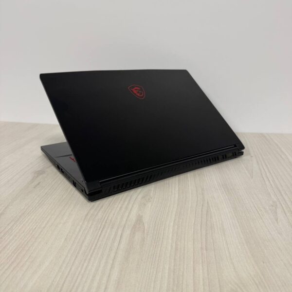 Ігровий ноутбук Б-клас MSI GF65 Thin 10SDR / 15.6" (1920x1080) IPS / Intel Core i7-10750H (6 (12) ядер по 2.6 - 5.0 GHz) / 8 GB DDR4 / 512 GB SSD NVMe / nVidia GeForce GTX 1660 Ti, 6 GB GDDR6, 192-bit / WebCam - Зображення 6