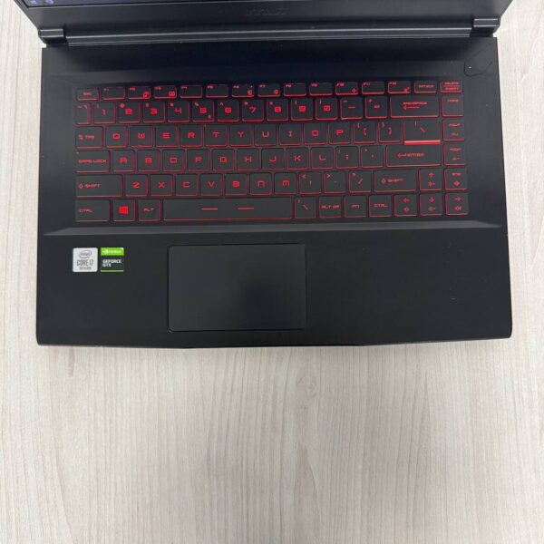 Ігровий ноутбук Б-клас MSI GF65 Thin 10SDR / 15.6" (1920x1080) IPS / Intel Core i7-10750H (6 (12) ядер по 2.6 - 5.0 GHz) / 8 GB DDR4 / 512 GB SSD NVMe / nVidia GeForce GTX 1660 Ti, 6 GB GDDR6, 192-bit / WebCam - Зображення 7