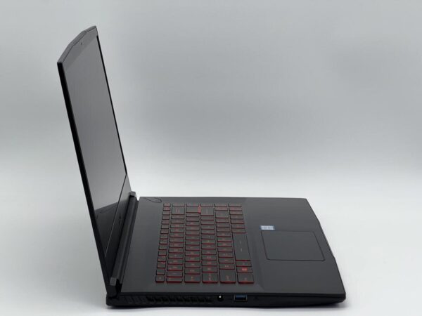 Ігровий ноутбук MSI GF63 8RD / 15.6" (1920x1080) IPS / Intel Core i7-8750H (6 (12) ядер по 2.2 - 4.1 GHz) / 16 GB DDR4 / 480 GB SSD / nVidia GeForce GTX 1050 Ti, 4 GB GDDR5, 128-bit / WebCam - Зображення 3