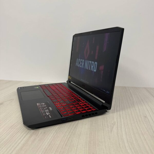 Ігровий ноутбук Б-клас Acer Nitro 5 AN515-55 / 15.6" (1920x1080) IPS / Intel Core i5-11400H (6 (12) ядeр по 2.7 - 4.5 GHz) / 16 GB DDR4 / 512 GB SSD NVMe / nVidia GeForce RTX 3050 Ti, 4 GB GDDR6, 128-bit / WebCam - Зображення 5