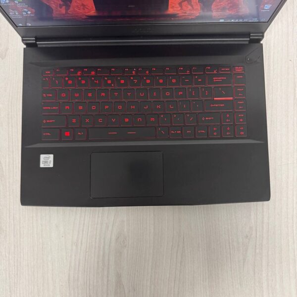 Ігровий ноутбук Б-клас MSI GF65 Thin 10SER / 15.6" (1920x1080) IPS / Intel Core i7-10750H (6 (12) ядер по 2.6 - 5.0 GHz) / 16 GB DDR4 / 512 GB SSD NVMe / nVidia GeForce RTX 2060, 6 GB GDDR6, 192-bit / WebCam - Зображення 7