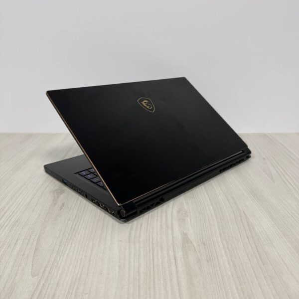 Ігровий ноутбук Б-класс MSI GS65 Stealth 9SE / 15.6" (1920x1080) IPS / Intel Core i7-9750H (6 (12) ядра по 2.6 - 4.5 GHz) / 16 GB DDR4 / 512 GB SSD NVMe / nVidia GeForce RTX 2060, 6 GB GDDR6, 192-bit / WebCam - Зображення 6