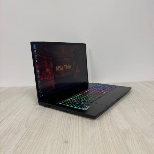 Ігровий ноутбук Б-клас MSI GF75 Thin 10UEK / 15.6" (1920x1080) IPS / Intel Core i7-10750H (6 (12) ядер по 2.6 - 5.0 GHz) / 16 GB DDR4 / 512 GB SSD NVMe / nVidia GeForce RTX 3060, 6 GB GDDR6, 192-bit / WebCam - Зображення 4
