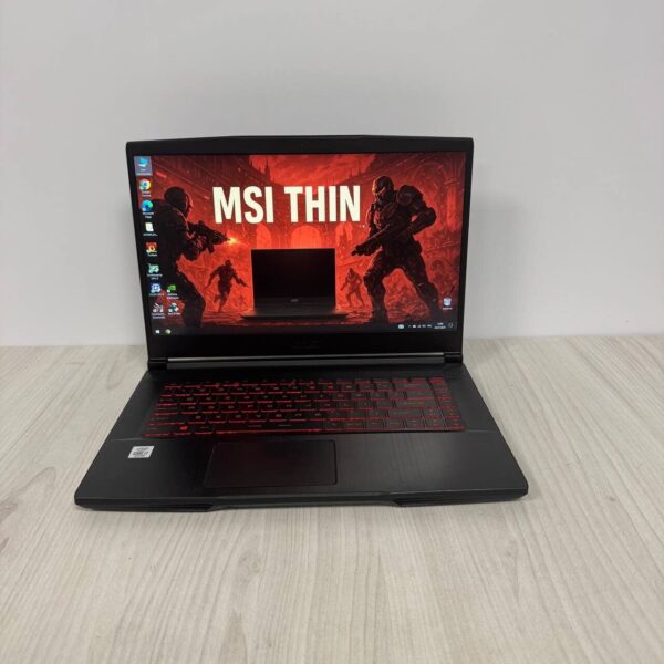 Ігровий ноутбук Б-клас MSI GF65 Thin 10SER / 15.6" (1920x1080) IPS / Intel Core i7-10750H (6 (12) ядер по 2.6 - 5.0 GHz) / 16 GB DDR4 / 512 GB SSD NVMe / nVidia GeForce RTX 2060, 6 GB GDDR6, 192-bit / WebCam - Зображення 2