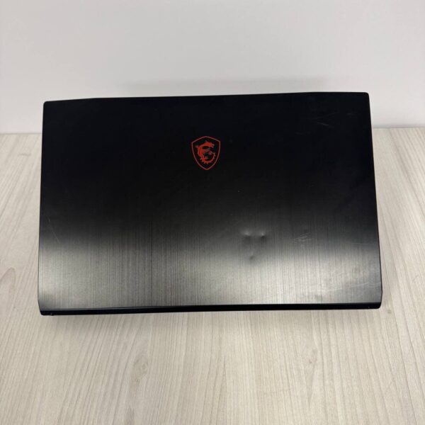 Ігровий ноутбук Б-клас MSI GF75 Thin 10UEK / 15.6" (1920x1080) IPS / Intel Core i7-10750H (6 (12) ядер по 2.6 - 5.0 GHz) / 16 GB DDR4 / 512 GB SSD NVMe / nVidia GeForce RTX 3060, 6 GB GDDR6, 192-bit / WebCam - Зображення 3