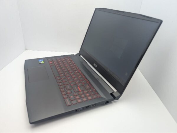 Ігровий ноутбук MSI Katana GF66 / 15.6" (1920x1080) IPS / Intel Core i5-11400H (6 (12) ядер по 2.2 - 4.5 GHz) / 16 GB DDR4 / 512 GB SSD / nVidia GeForce RTX 3050 Ti, 4 GB GDDR6, 128-bit / WebCam / Коробка - Зображення 9