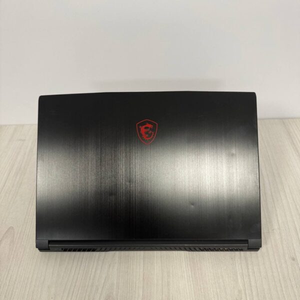 Ігровий ноутбук Б-клас MSI GF65 Thin 10SER / 15.6" (1920x1080) IPS / Intel Core i7-10750H (6 (12) ядер по 2.6 - 5.0 GHz) / 16 GB DDR4 / 512 GB SSD NVMe / nVidia GeForce RTX 2060, 6 GB GDDR6, 192-bit / WebCam - Зображення 3