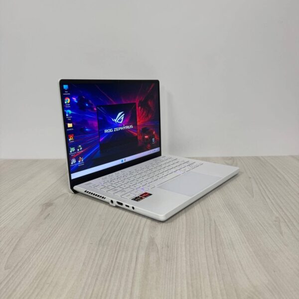 Ігровий ультрабук Б-клас Asus ROG Zephyrus G14 GA402RK / 14" (2560x1600) IPS / AMD Ryzen 9 6900HS (8 (16) ядер по 3.3 - 4.9 GHz) / 16 GB DDR5 / 1000 GB SSD NVMe / AMD Radeon RX 6800S, 8 GB GDDR6, 128-bit / WebCam - Зображення 4