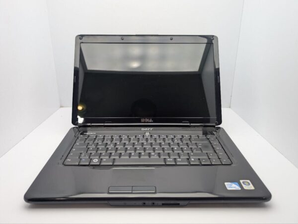 Ноутбук Dell Inspiron 1545 / 15.6" (1366x768) TN / Intel Pentium T4300 (2 ядра по 2.1 GHz) / 4 GB DDR2 / 250 GB HDD / Intel GMA 4500M Graphics / WebCam / DVD-ROM / АКБ не трммає - Зображення 3