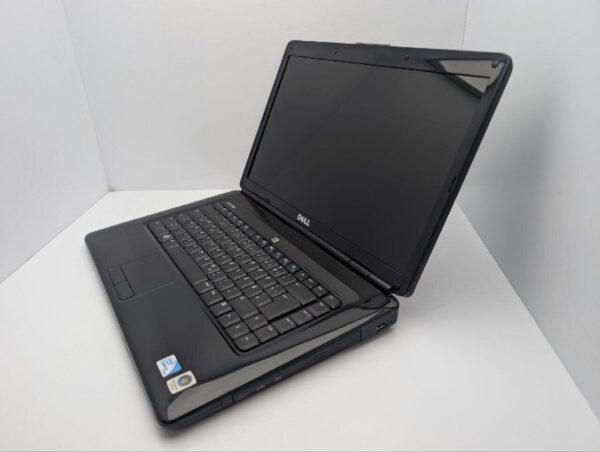 Ноутбук Dell Inspiron 1545 / 15.6" (1366x768) TN / Intel Pentium T4300 (2 ядра по 2.1 GHz) / 4 GB DDR2 / 250 GB HDD / Intel GMA 4500M Graphics / WebCam / DVD-ROM / АКБ не трммає - Зображення 7
