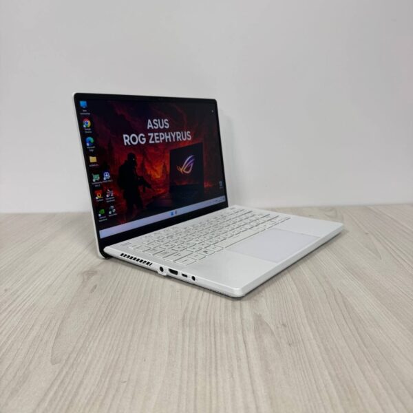 Ігровий ультрабук Asus ROG Zephyrus G14 GA402XV / 14" (2560x1600) IPS / AMD Ryzen 9 7940HS (8 (16) ядер по 4.0 - 5.2 GHz) / 16 GB DDR5 / 512 GB SSD / nVidia GeForce RTX 4060, 8 GB GDDR6, 128-bit / WebCam - Зображення 4