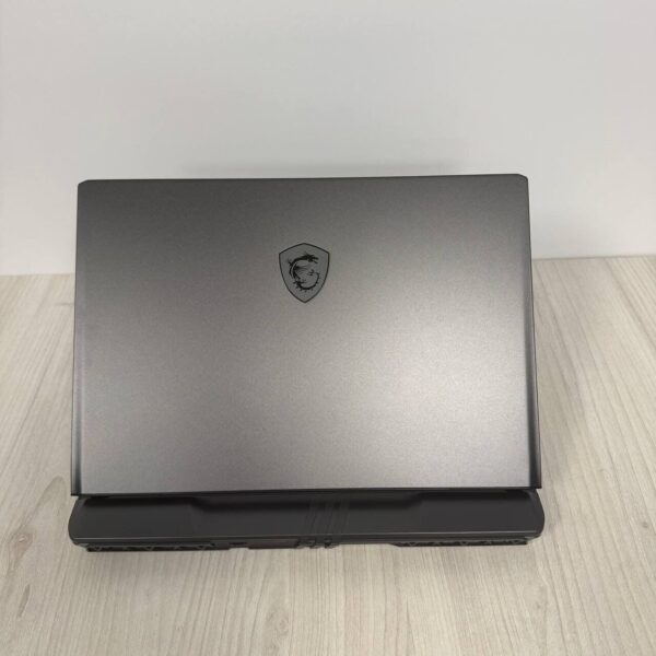 Ігровий ноутбук Б-клас MSI Vector GP68HX 12VH / 16" (1920x1200) IPS / Intel Core i9-12900HX (16 (24) ядер по 3.6 - 5.0 GHz) / 32 GB DDR5 / 1000 GB SSD NVMe / nVidia GeForce RTX 4080, 12 GB GDDR6, 192-bit / WebCam - Зображення 3