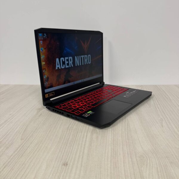 Ігровий ноутбук Б-клас Acer Nitro 5 AN515-45 / 15.6" (1920x1080) IPS / AMD Ryzen 5 5600H (6 (12) ядер по 3.0 - 4.2 GHz) / 16 GB DDR4 / 512 GB SSD NVMe / nVidia GeForce RTX 3050, 4 GB GDDR6, 128-bit / WebCam - Зображення 4