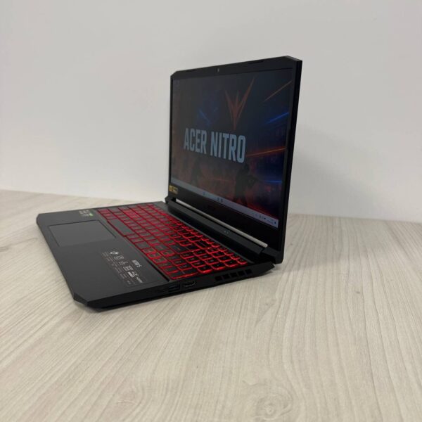 Ігровий ноутбук Б-клас Acer Nitro 5 AN515-45 / 15.6" (1920x1080) IPS / AMD Ryzen 5 5600H (6 (12) ядер по 3.0 - 4.2 GHz) / 16 GB DDR4 / 512 GB SSD NVMe / nVidia GeForce RTX 3050, 4 GB GDDR6, 128-bit / WebCam - Зображення 5