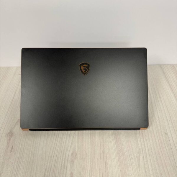 Ігровий ноутбук Б-клас MSI GS75 Stealth 10SE / 17.3" (1920x1080) IPS / Intel Core i7-10875H (8 (16) ядра по 2.3 - 5.1 GHz) / 16 GB DDR4 / 512 GB SSD NVMe / nVidia GeForce RTX 2060, 6 GB GDDR6, 192-bit / WebCam - Зображення 3