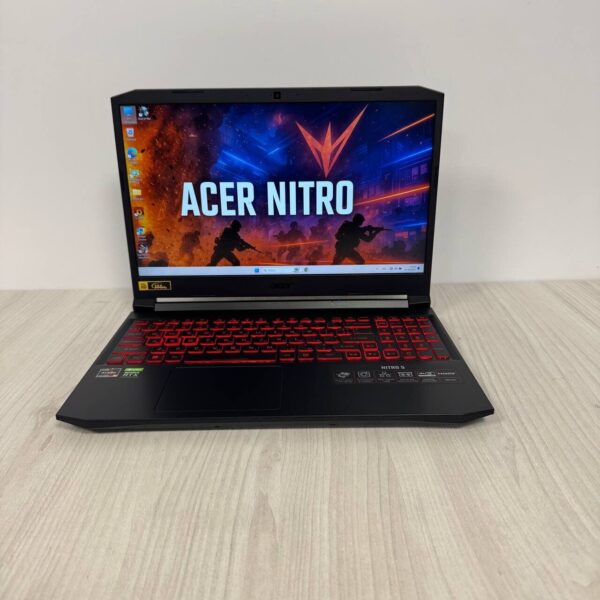 Ігровий ноутбук Б-клас Acer Nitro 5 AN515-45 / 15.6" (1920x1080) IPS / AMD Ryzen 5 5600H (6 (12) ядер по 3.0 - 4.2 GHz) / 16 GB DDR4 / 512 GB SSD NVMe / nVidia GeForce RTX 3050, 4 GB GDDR6, 128-bit / WebCam - Зображення 2