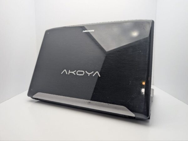Ноутбук Medion Akoya P6812 / 15.6" (1366x768) TN / Intel Core i3-2330M (2 (4) ядра по 2.2 GHz) / 6 GB DDR3 / 750 GB HDD / nVidia GeForce GT 555M, 1 GB GDDR3, 128-bit / WebCam - Зображення 8