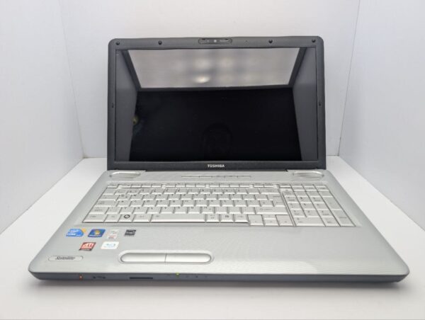 Ноутбук Toshiba Satellite L550 / 17.3" (1600x900) TN / Intel Core i3-330M (2 (4) ядра по 2.13 GHz) / 6 GB DDR3 / 320 GB HDD / AMD Radeon HD 4650, 1 GB GDDR3, 128-bit / WebCam / DVD-ROM - Зображення 3