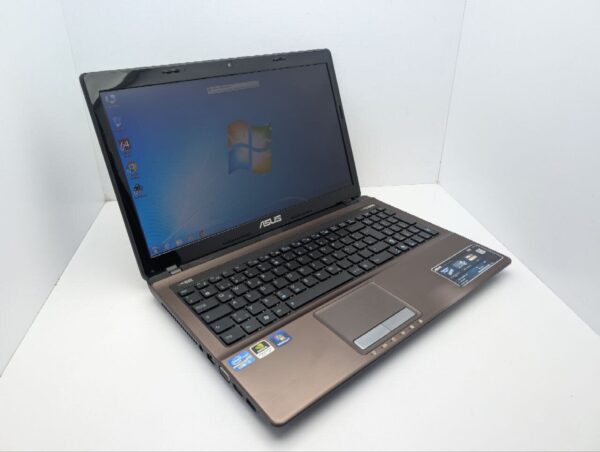 Ноутбук Asus X53S / 15.6'' (1366x768) TN / Intel Core i3-2330M (2 (4) ядра по 2.2 GHz) / 6 GB DDR3 / 320 GB HDD / nVidia GeForce GT 540M, 1 GB GDDR3, 128-bit / WebCam / DVD-ROM - Зображення 6