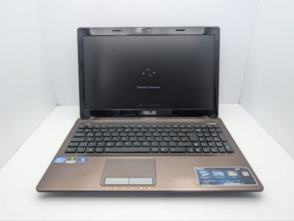 Ноутбук Asus X53S / 15.6'' (1366x768) TN / Intel Core i3-2330M (2 (4) ядра по 2.2 GHz) / 6 GB DDR3 / 320 GB HDD / nVidia GeForce GT 540M, 1 GB GDDR3, 128-bit / WebCam / DVD-ROM - Зображення 3