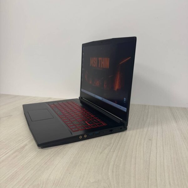 Ігровий ноутбук Б-клас MSI GF63 Thin 11UC / 15.6" (1920x1080) IPS / Intel Core i5-11400H (6 (12) ядер по 2.7 - 4.5 GHz) / 8 GB DDR4 / 512 GB SSD NVMe / nVidia GeForce RTX 3050, 4 GB GDDR6, 128-bit / WebCam - Зображення 5