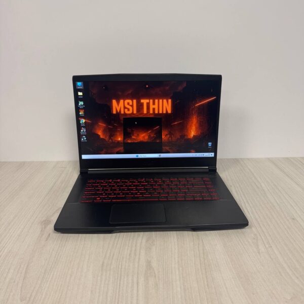 Ігровий ноутбук Б-клас MSI GF63 Thin 11UC / 15.6" (1920x1080) IPS / Intel Core i5-11400H (6 (12) ядер по 2.7 - 4.5 GHz) / 8 GB DDR4 / 512 GB SSD NVMe / nVidia GeForce RTX 3050, 4 GB GDDR6, 128-bit / WebCam - Зображення 2