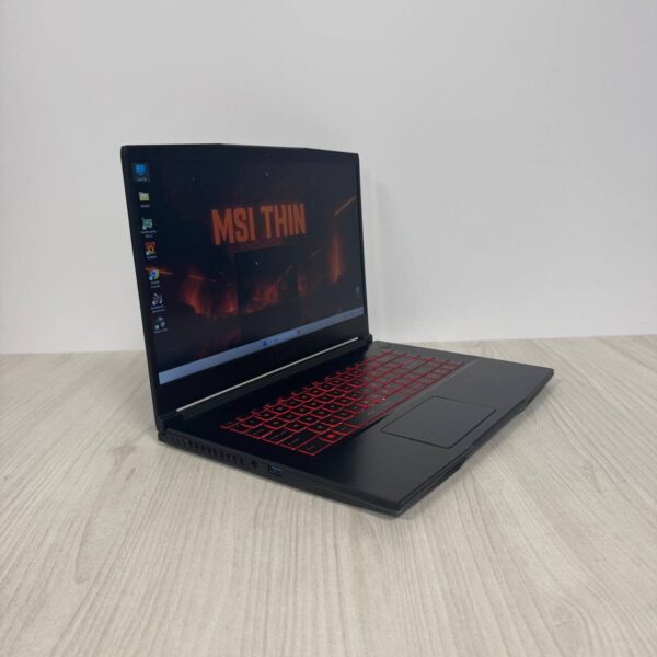 Ігровий ноутбук Б-клас MSI GF63 Thin 11UC / 15.6" (1920x1080) IPS / Intel Core i5-11400H (6 (12) ядер по 2.7 - 4.5 GHz) / 8 GB DDR4 / 512 GB SSD NVMe / nVidia GeForce RTX 3050, 4 GB GDDR6, 128-bit / WebCam - Зображення 4