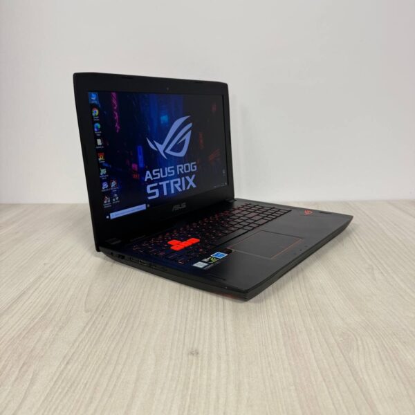 Ігровий ноутбук Б-клас Asus ROG Strix GL502VSK / 15.6" (1920x1080) IPS / Intel Core i7-7700HQ (4 (8) ядра по 2.8 - 3.8 GHz) / 16 GB DDR4 / 256 GB SSD NVMe / nVidia GeForce GTX 1070, 8 GB GDDR5, 256-bit / WebCam - Зображення 4