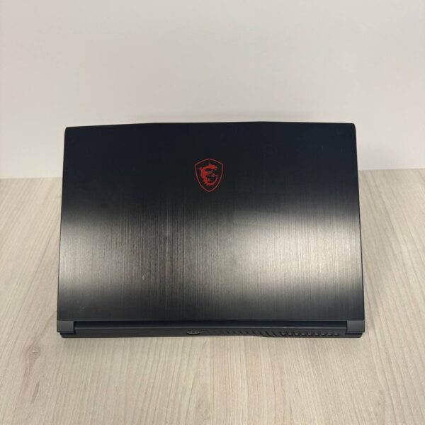 Ігровий ноутбук Б-клас MSI GF63 Thin 11UC / 15.6" (1920x1080) IPS / Intel Core i5-11400H (6 (12) ядер по 2.7 - 4.5 GHz) / 8 GB DDR4 / 512 GB SSD NVMe / nVidia GeForce RTX 3050, 4 GB GDDR6, 128-bit / WebCam - Зображення 3