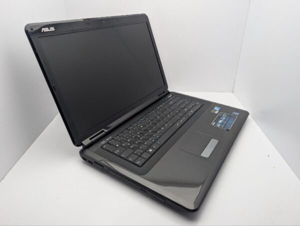 Ноутбук Asus K70 / 17.3" (1600x900) TN / Intel Core 2 Duo T6600 (2 ядра по 2.2 GHz) / 4 GB DDR2 / 320 GB HDD / nVidia GeForce 220M, 1 GB GDDR2, 128-bit / WebCam / DVD-ROM - Зображення 5