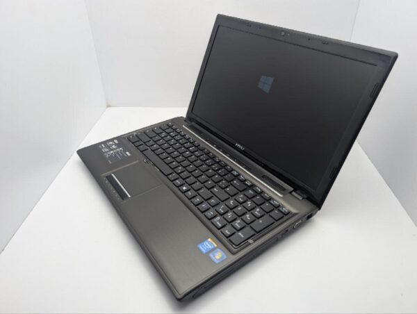 Ноутбук MSI CR61 / 15.6" (1366x768) TN / Intel Core i5-4200M (2 (4) ядра по 2.5 - 3.1 GHz) / 8 GB DDR3 / 1000 GB HDD / Intel HD Graphics 4600 / WebCam / DVD-ROM - Зображення 7