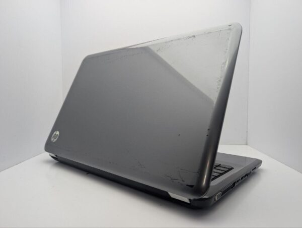 Ноутбук HP Pavillion g7-1206ss / 17.3" (1600x900) TN / Intel Core i5-2430M (2 (4) ядра по 2.4 - 3.0 GHz) / 6 GB DDR3 / 750 GB HDD / AMD Radeon HD 6470M, 1 GB GDDR3, 64-bit / WebCam / DVD-ROM - Зображення 8