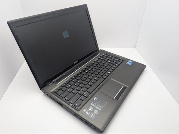 Ноутбук MSI CR61 / 15.6" (1366x768) TN / Intel Core i5-4200M (2 (4) ядра по 2.5 - 3.1 GHz) / 8 GB DDR3 / 1000 GB HDD / Intel HD Graphics 4600 / WebCam / DVD-ROM - Зображення 6