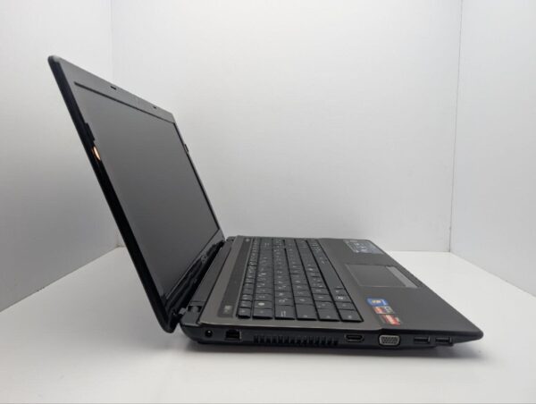 Ноутбук Asus X53B / 15.6" (1366x768) TN / AMD E-350 (2 ядра по 1.6 GHz) / 6 GB DDR3 / 120 GB SSD / AMD Radeon HD 6310 Graphics / WebCam / DVD-ROM - Зображення 4