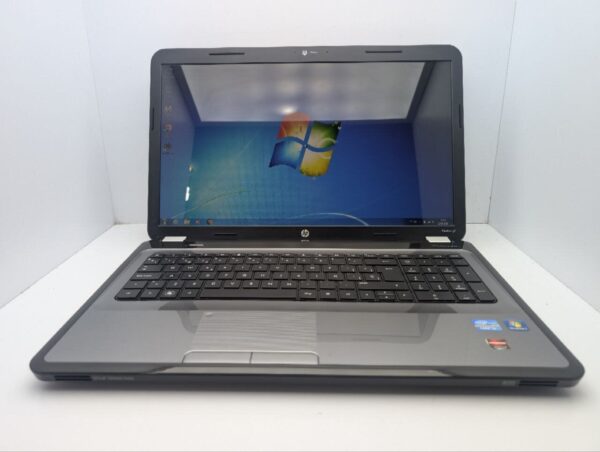Ноутбук HP Pavillion g7-1206ss / 17.3" (1600x900) TN / Intel Core i5-2430M (2 (4) ядра по 2.4 - 3.0 GHz) / 6 GB DDR3 / 750 GB HDD / AMD Radeon HD 6470M, 1 GB GDDR3, 64-bit / WebCam / DVD-ROM - Зображення 2