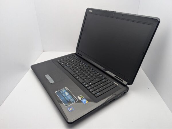 Ноутбук Asus K70 / 17.3" (1600x900) TN / Intel Core 2 Duo T6600 (2 ядра по 2.2 GHz) / 4 GB DDR2 / 320 GB HDD / nVidia GeForce 220M, 1 GB GDDR2, 128-bit / WebCam / DVD-ROM - Зображення 6