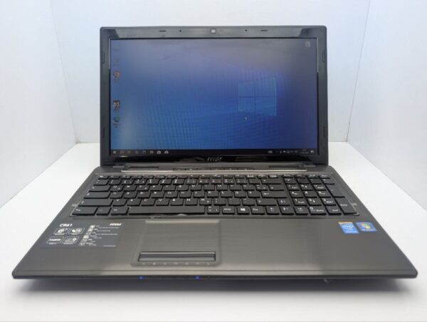 Ноутбук MSI CR61 / 15.6" (1366x768) TN / Intel Core i5-4200M (2 (4) ядра по 2.5 - 3.1 GHz) / 8 GB DDR3 / 1000 GB HDD / Intel HD Graphics 4600 / WebCam / DVD-ROM - Зображення 2