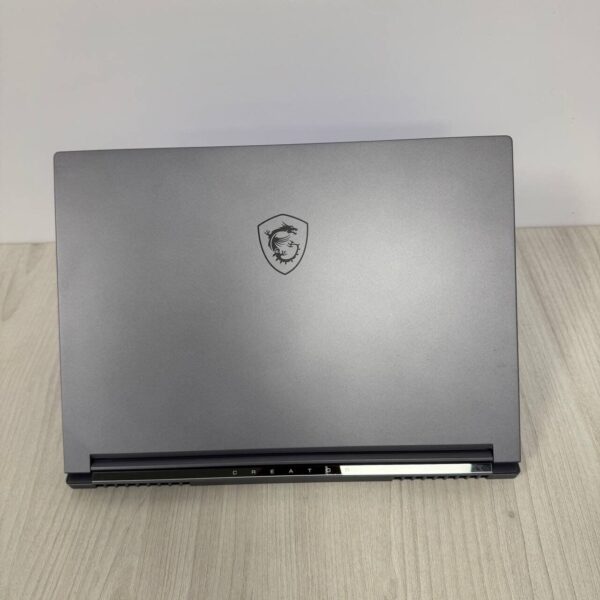 Ігровий ноутбук Б-клас MSI Creator 16 AI Studio A1VHG / 16" (3840x2400) IPS / Intel Core Ultra 9 185H (16 (22) ядер по 3.9 - 5.1 GHz) / 32 GB DDR5 / 1000 GB SSD NVMe / nVidia GeForce RTX 4080, 12 GB GDDR6, 192-bit / WebCam - Зображення 3