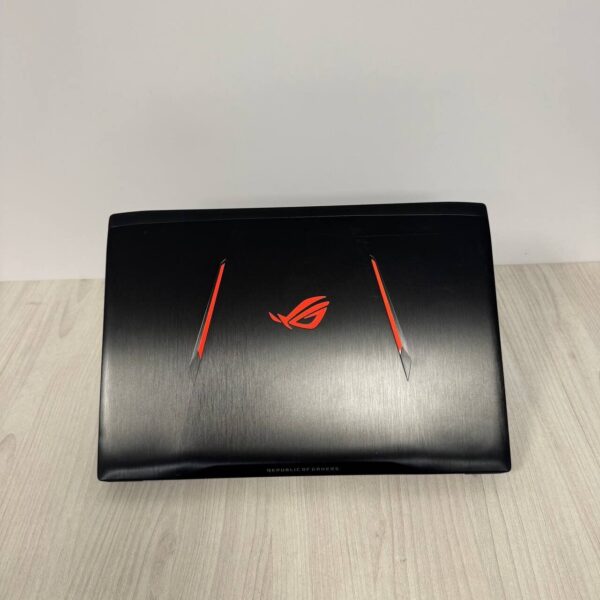 Ігровий ноутбук Б-клас Asus ROG Strix GL502VM / 15.6" (1920x1080) IPS / Intel Core i7-7700HQ (4 (8) ядра по 2.8 - 3.8 GHz) / 16 GB DDR4 / 128 GB SSD NVMe + 1000 GB HDD / nVidia GeForce GTX 1060, 3 GB GDDR5, 192-bit / WebCam - Зображення 3