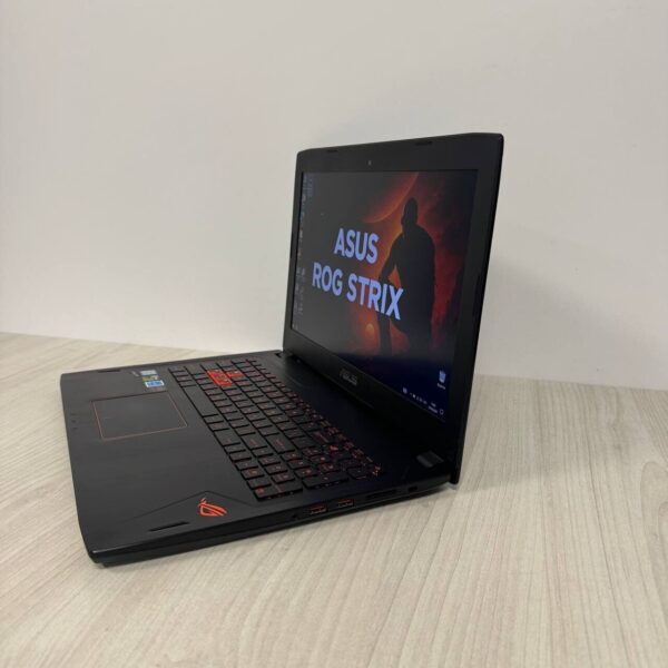 Ігровий ноутбук Б-клас Asus ROG Strix GL502VM / 15.6" (1920x1080) IPS / Intel Core i7-7700HQ (4 (8) ядра по 2.8 - 3.8 GHz) / 16 GB DDR4 / 128 GB SSD NVMe + 1000 GB HDD / nVidia GeForce GTX 1060, 3 GB GDDR5, 192-bit / WebCam - Зображення 5