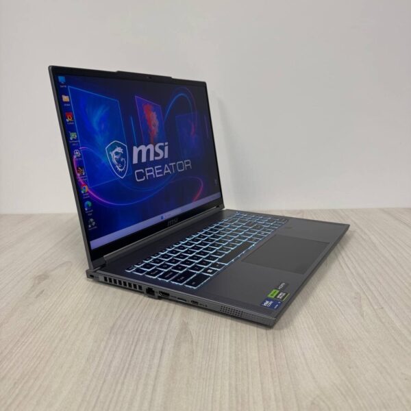 Ігровий ноутбук Б-клас MSI Creator 16 AI Studio A1VHG / 16" (3840x2400) IPS / Intel Core Ultra 9 185H (16 (22) ядер по 3.9 - 5.1 GHz) / 32 GB DDR5 / 1000 GB SSD NVMe / nVidia GeForce RTX 4080, 12 GB GDDR6, 192-bit / WebCam - Зображення 4