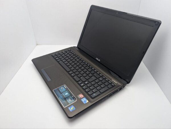 Ноутбук Asus X52J / 15.6" (1366x768) TN / Intel Core i3-350M (2 (4) ядра по 2.2 GHz) / 6 GB DDR3 / 320 GB HDD / AMD Radeon HD 5145, 1 GB GDDR3, 64-bit / WebCam / DVD-ROM - Зображення 7