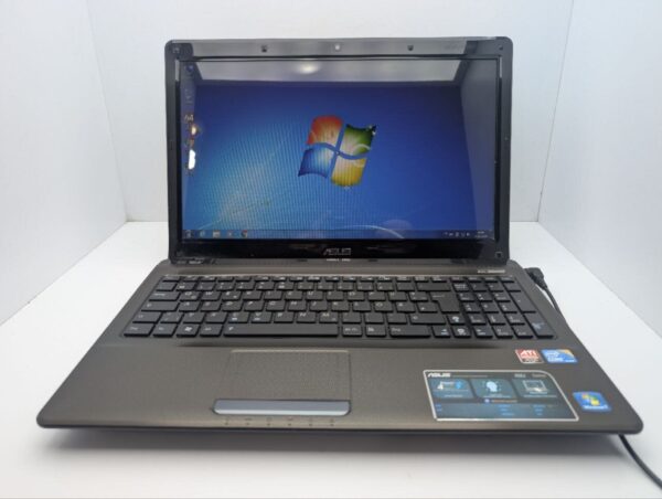 Ноутбук Asus X52J / 15.6" (1366x768) TN / Intel Core i3-350M (2 (4) ядра по 2.2 GHz) / 6 GB DDR3 / 320 GB HDD / AMD Radeon HD 5145, 1 GB GDDR3, 64-bit / WebCam / DVD-ROM - Зображення 2