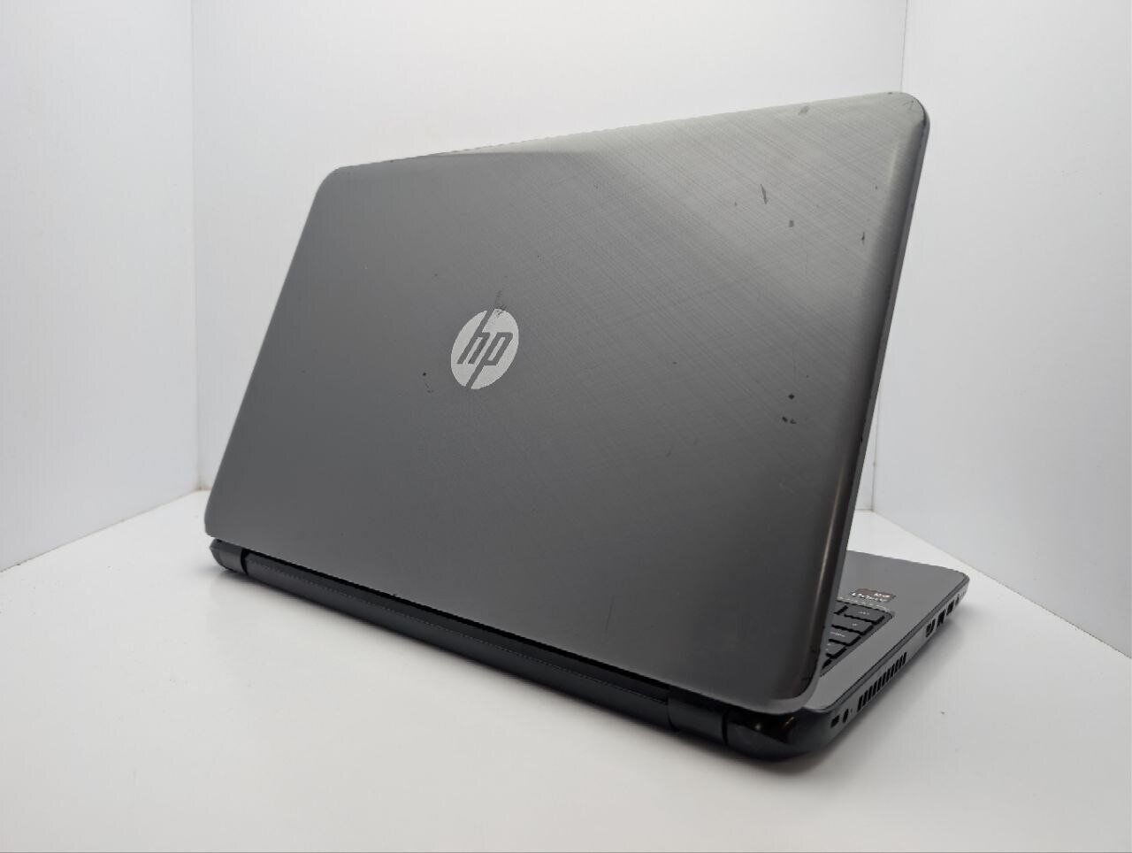 Ноутбук HP 15 g003sr / 15.6" (1366x768) TN / AMD A8-6410 (4 ядра по 2.0 - 2.4 GHz) / 8 GB DDR3 / 128 GB SSD / AMD Radeon R5 Graphics / WebCam / DVD-ROM - Зображення 8